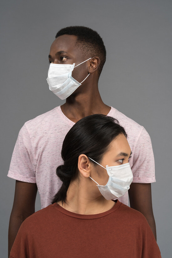 Man and woman in medical masks